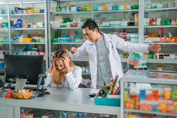female pharmacist depressed at work being scolded by her friend at the pharmacy