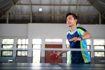 Dropped balls will be received on a paddle by the male players at the ping pong table