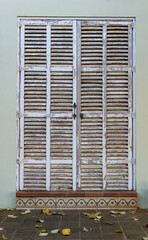 Fototapeta premium White Mallorcan shutter door closed