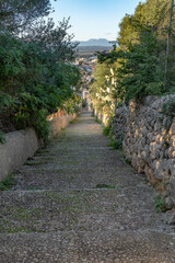 Rural cobblestone road at sunset
