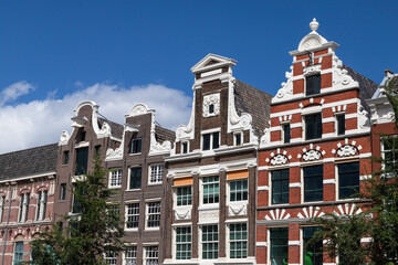 Historic facades of the canal houses along the Rokin, between Dam Square and Muntplein in Amsterdam.