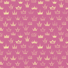 Seamless backrgound with yellow doodle crowns on pink background. Can be used for wallpaper, pattern fills, textile, web page background, surface textures.