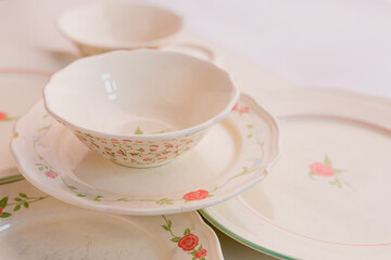 Closeup of porcelain plates and bowls