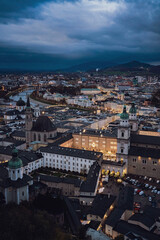 Beautiful of Aerial panoramic winter view of historic Salzburg, Austria, with Salzach river, Christmas markets and dramatic sky  - Medium - Landscape