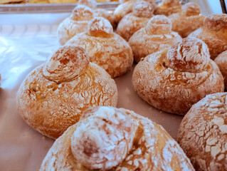 Shelf-stable breads for sale in commercial premises, culinary art and delicious handmade desserts.