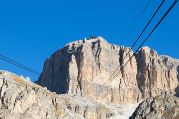 The gondola cable way up to the Sass Pordoi mountainon a clear and beautiful day