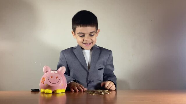 Child in a suit collecting coins. Good return on investment. High quality 4k footage