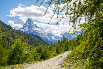 bike trail in the Swiss alps with a view of the Matterhorn, Zermatt Switzerland