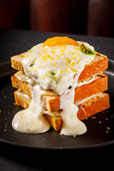 sandwich with egg and melted cheese