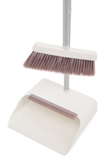 Kit of the plastic broom with gray bristles for sweeping floors and long-handled dustpan on a white background. Close up