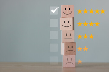 Satisfaction rating very impressed. Wooden block cube with 1 to 5 star icon to give satisfaction in...