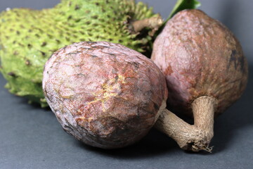 Fresh Custard apple or Bullock`s heart fruit isolated on black background 