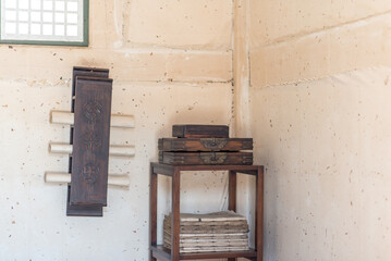 Interior of Korean Traditional room. Old books in a bookshelf 