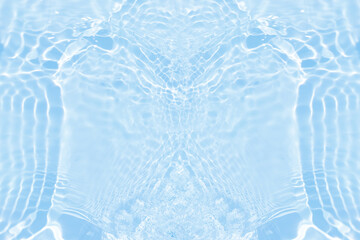 Defocus blurred transparent blue colored clear calm water surface texture with splashes and bubbles. Trendy abstract nature background. Water waves in sunlight with caustics. Blue water shinning
