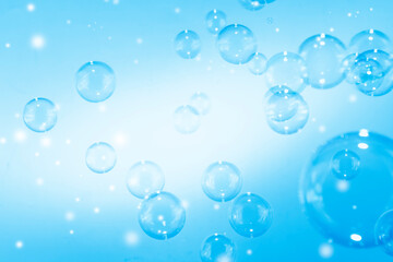 Beautiful Transparent Blue Soap Bubbles Abstract Background. Soap Sud Bubbles Water.