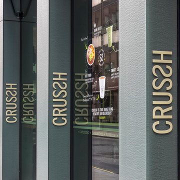 LONDON, UK - FEBRUARY 18, 2018: 
 Signage on exterior of Crussh Fit Food and Juice Bar in Bevis Marks, City of London