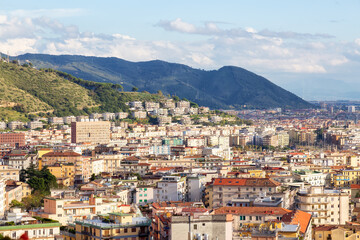 Fototapeta na wymiar Touristic City by the Sea. Salerno, Italy. Aerial View. Cityscape and mountains background
