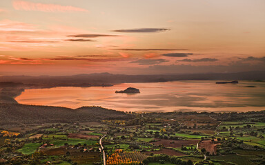 Montefiascone, Viterbo, Lazio, Italy: landscape at sunset of the Lake Bolsena - obrazy, fototapety, plakaty