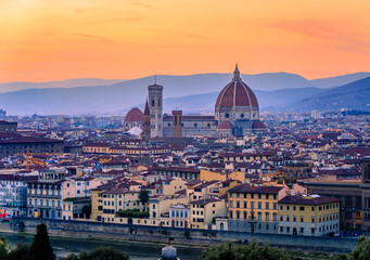 Fototapeta na wymiar Sunset view of the Duomo cathedral and Bell Tower of Giotto in Florence, Italy