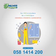 Cleaning service with professional equipment during work An employee of a professional cleaning service in overalls washes the glass of the windows of the facade of the building.