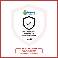 Cleaning service with professional equipment during work An employee of a professional cleaning service in overalls washes the glass of the windows of the facade of the building.