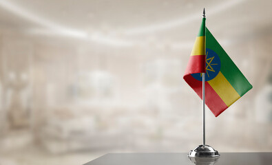 A small Ethiopia flag on an abstract blurry background