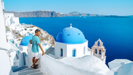 Santorini Greece, young men on vacation at the Island of Greece Santorini Europe at summer