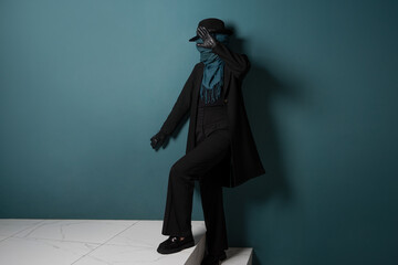 Unknown. Nobody, the concept of the identity crisis. An impersonal person. A person in a coat and...