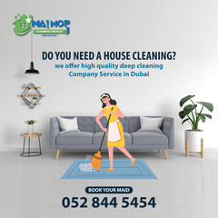 Cleaning service with professional equipment during work An employee of a professional cleaning service in overalls washes the glass of the windows of the facade of the building.