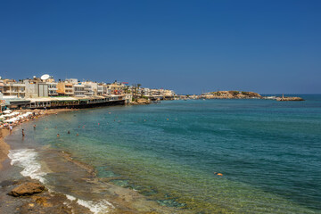 View of the beach on the Greek island of Crete in Hersonissos - 557533951