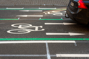 bike lane in the city blocked by a car