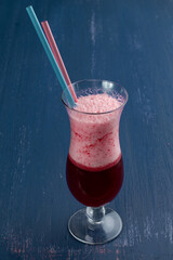 Glass of milkshake with whipped cream