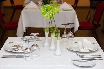 Served dinner table in a restaurant. Restaurant interior