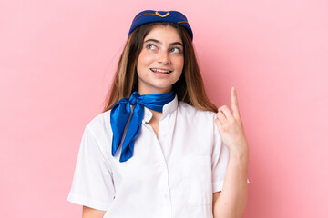 Airplane stewardess caucasian woman isolated on pink background thinking an idea
