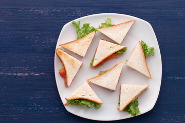 eight sandwiches on the plate