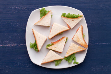 eight sandwiches on the plate