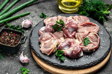 Stomachs chicken. Raw uncooked chicken gizzards, stomach. Culinary, cooking, concept. banner, menu, recipe place for text, top view