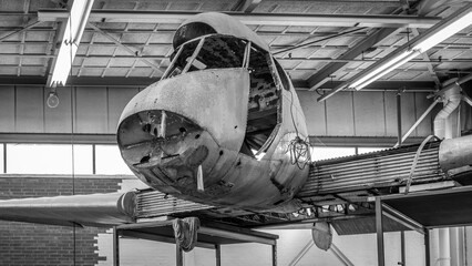 empty frame of an airplane in a hangar