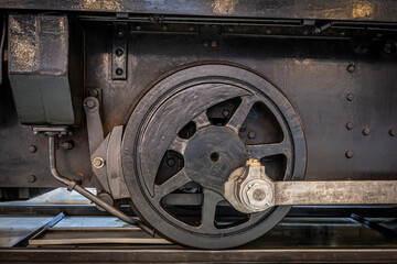 close up of the wheel from an old diesel locomotive 