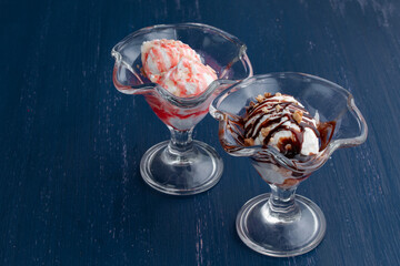 Bowl with caramel ice cream on table