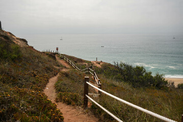 Descending trail overlooking the ocean