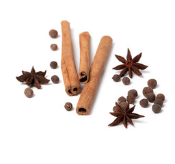 Cinnamon sticks, anise stars and black peppercorns