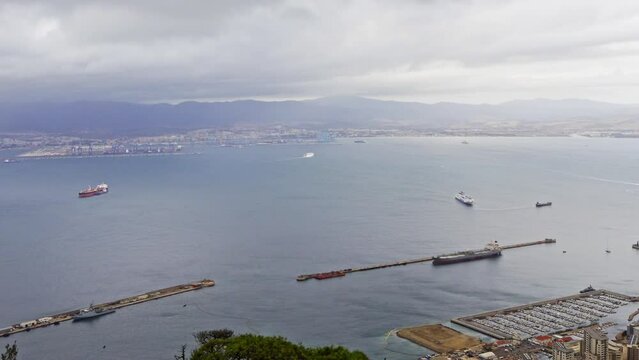 Panoramic view of the bay of Cadiz from the top of the Rock of Gibraltar on a cloudy day.