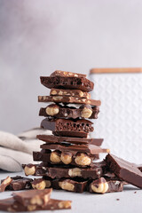 Pieces of chocolate bars with nuts for tasty break