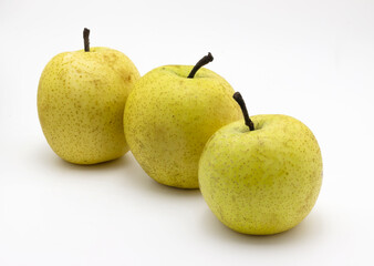 bunch of green apple pears on white background