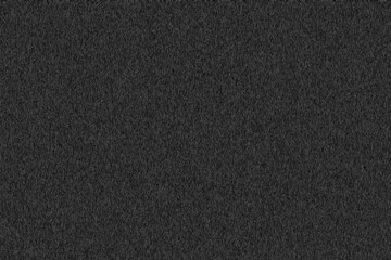 The background image is a black wall with a stucco pattern.