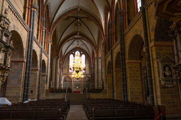 Obraz premium The Old City of Bremen, Market Place, Old Buildings, St. Petri Dom, Roland Statue, old statues of Bremen, Germany from inside man standing in the church