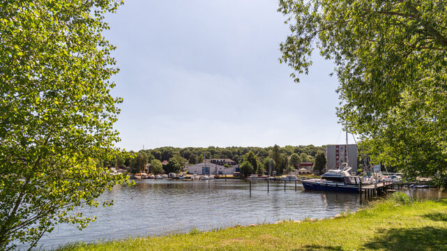 City park at Obereider in Rendsburg, Germany with river view and lush greenery
