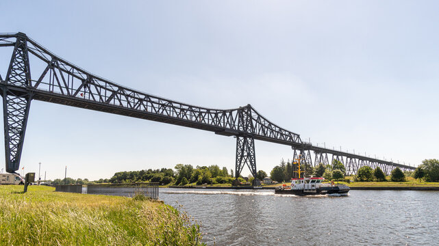 Rendsburg High Bridge over Kiel Canal in Germany with transporter gondola and ship traffic
