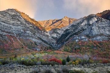 Sunrise over a riot of autumn colors in Provo Canyon in Utah's Wasatch Mountains